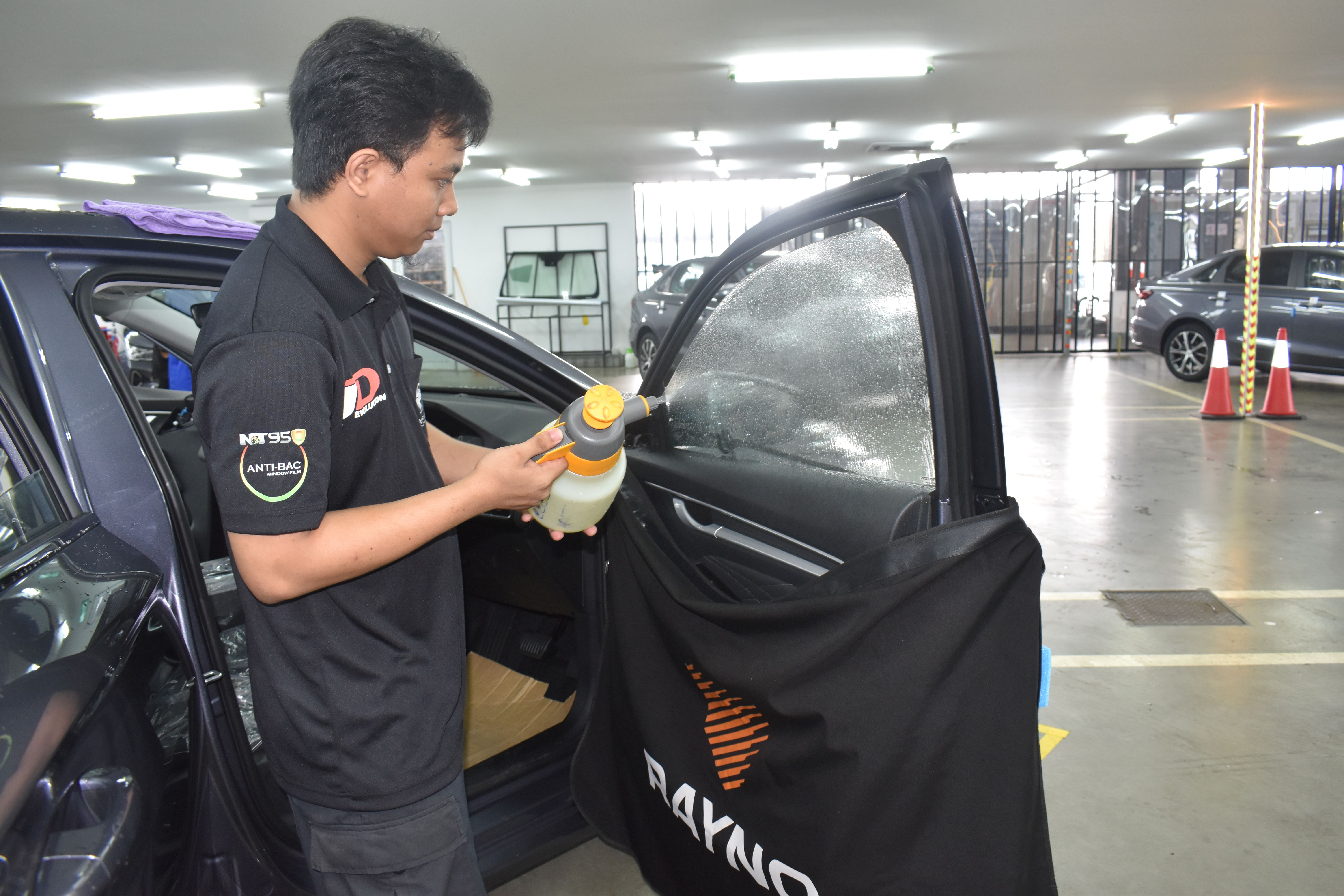 staff-at-work-at-proton-tint-centre
