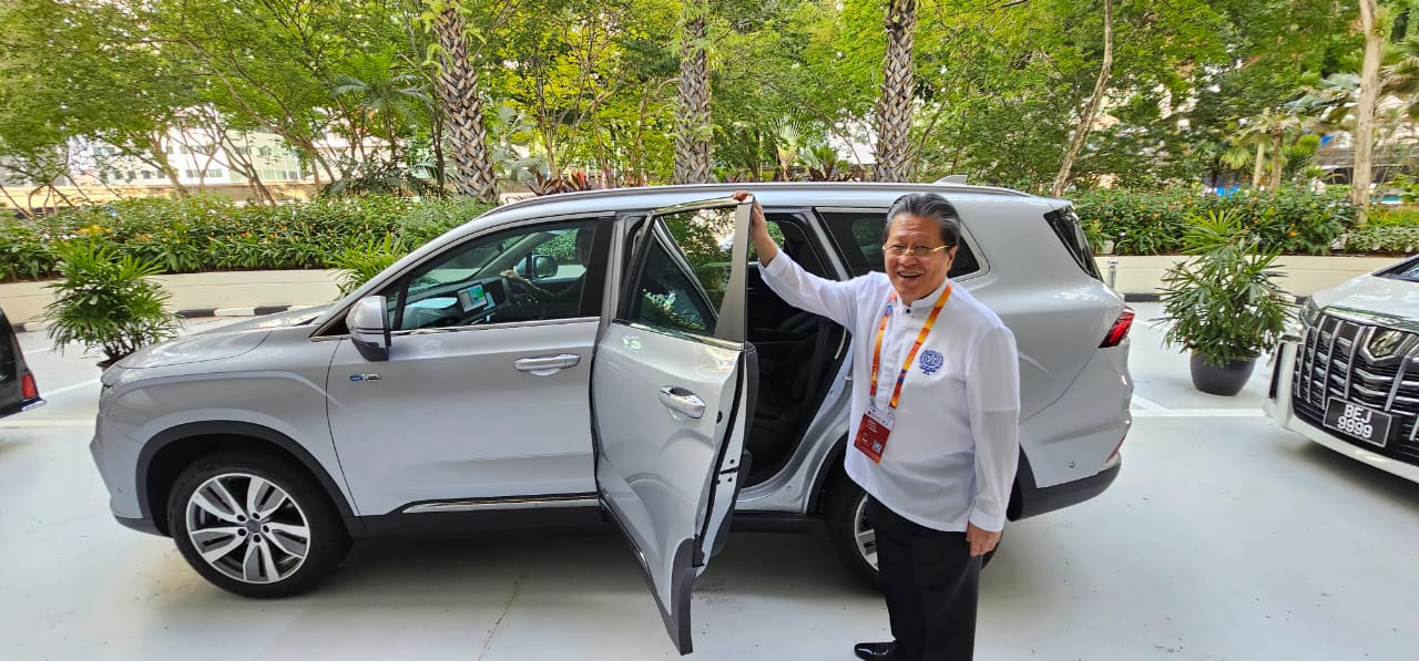 dr-cecilio-k-pedro-federation-of-filipinochinese-chambers-of-commerce-and-industry-taking-proton-x90